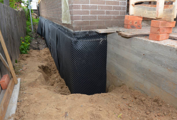 Happy homeowners after waterproofing job in Union Springs